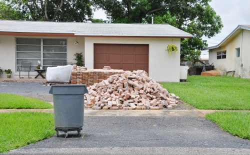 Small skip on a suburban driveway in Wallington