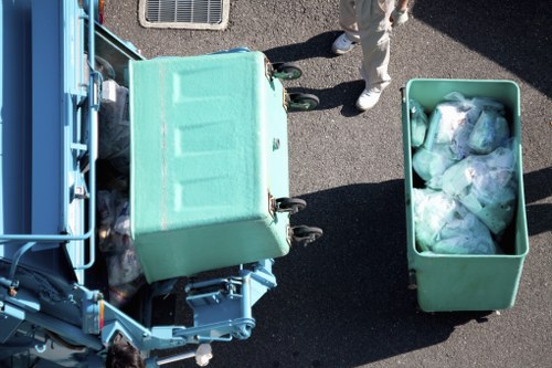 Crew loading bulky waste from a terrace house